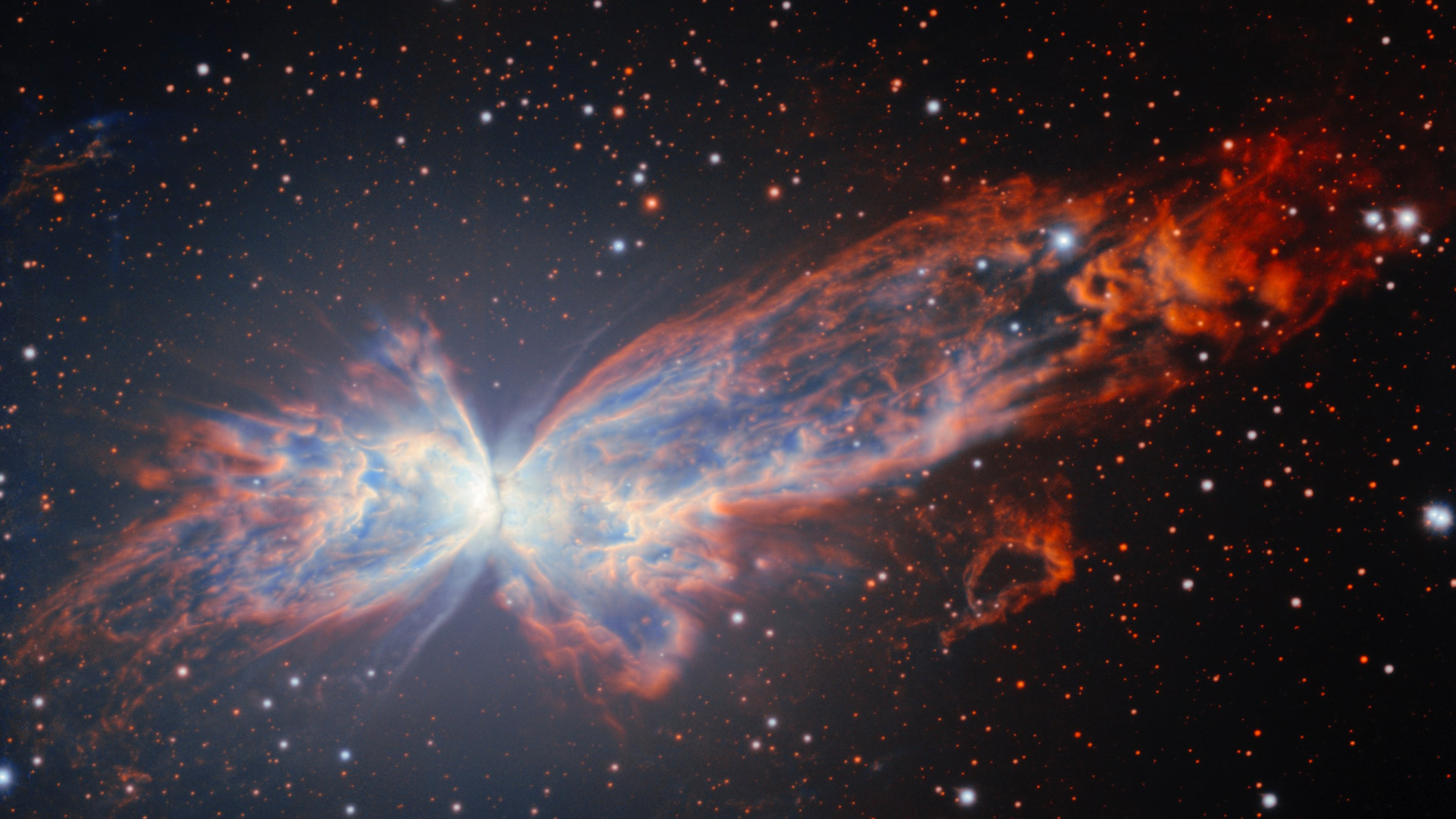 This image provided by NSF NOIRLab shows NGC 6302, a billowing planetary nebula that resembles a cosmic butterfly. (NSF NOIRLab via AP)