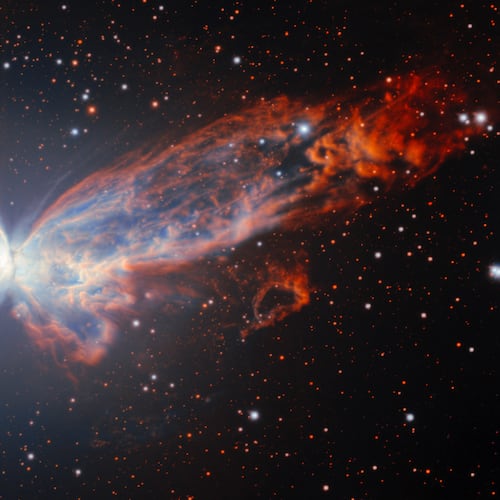 This image provided by NSF NOIRLab shows NGC 6302, a billowing planetary nebula that resembles a cosmic butterfly. (NSF NOIRLab via AP)
