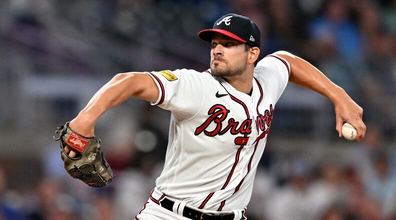 Atlanta Braves' relief pitcher Brad Hand (45) throws a pitch during the eighth inning at Truist Park, Tuesday, Sept. 26, 2023, in Atlanta. Atlanta Braves won 7-6 over Chicago Cubs.(Hyosub Shin / Hyosub.Shin@ajc.com)