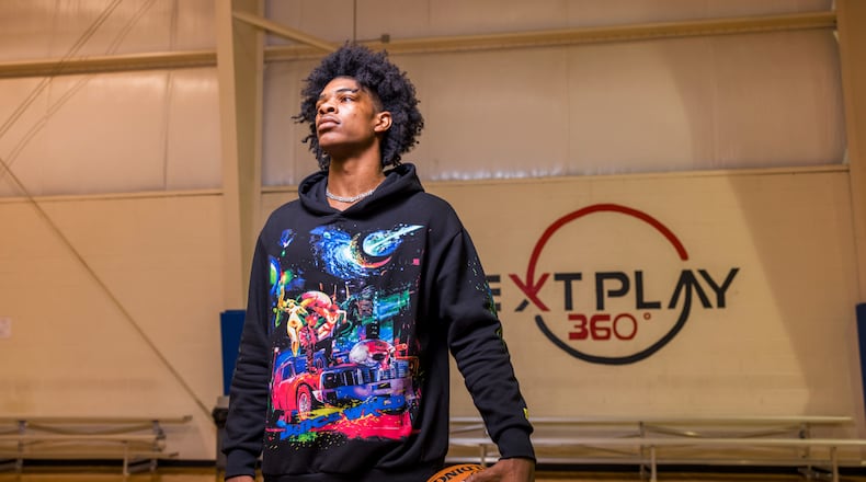 Scoot Henderson, 17, who has reclassified to graduate high school a year early and will bypass college to play professional basketball with the G League Ignite, at Next Play 360, a gym his family opened in Marietta, Ga., May 19, 2021. He would become the first player to spend two years with the team, which is designed to offer elite prospects an alternative to playing in college or overseas before becoming eligible for the NBA draft. (Lynsey Weatherspoon/The New York Times)