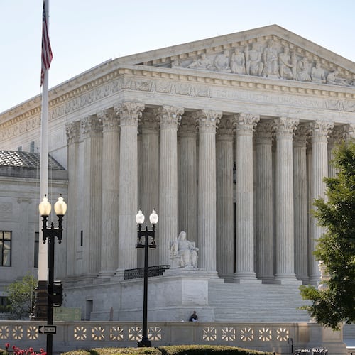 The Supreme Court is seen on the morning after the conservative majority sided with the Trump administration in a case over President Donald Trump's executive order restricting mail-in voting, on Capitol Hill in Washington, Tuesday, Aug. 25, 2026. (AP Photo/J. Scott Applewhite)