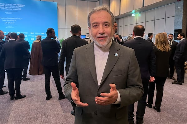 Iranian Foreign Minister Abbas Araghchi speaks to the media as he arrives to the Council of Foreign Ministers of the Organisation of Islamic Cooperation meeting, in Istanbul, Turkey, Saturday, June 21, 2025. (AP Photo/Mehmet Guzel)