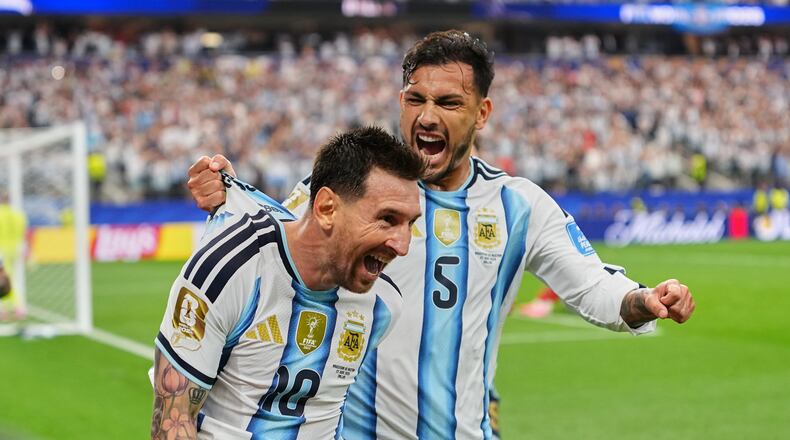Argentina's Lionel Messi, center, celebrates after scoring his side's second goal during the World Cup Group J soccer match between Argentina and Austria in Arlington, Texas, near Dallas, Monday, June 22, 2026. (AP Photo/Julio Cortez)