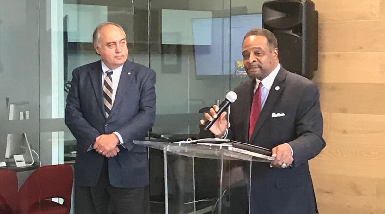 Augusta University School of Computer and Cyber Sciences dean Alexander Schwarzmann listens as Clark Atlanta University President George T. French Jr. discusses a cyber technology educational partnership between the two universities.