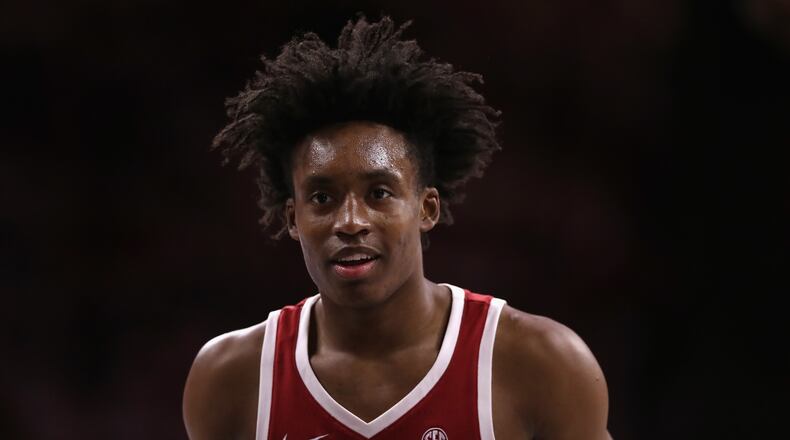 TUCSON, AZ - DECEMBER 09:  Collin Sexton #2 of the Alabama Crimson Tide handles the ball during the first half of the college basketball game against the Arizona Wildcats at McKale Center on December 9, 2017 in Tucson, Arizona. The Wildcats defeated the Crimson Tide 88-82.  (Photo by Christian Petersen/Getty Images)