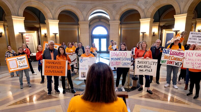 Miraya Gran speaks in the rotunda during an April 18 rally for IVF insurance coverage at the Minnesota State Capitol in St. Paul, Minn. (Carlos Gonzalez/Minneapolis Star Tribune/TNS)