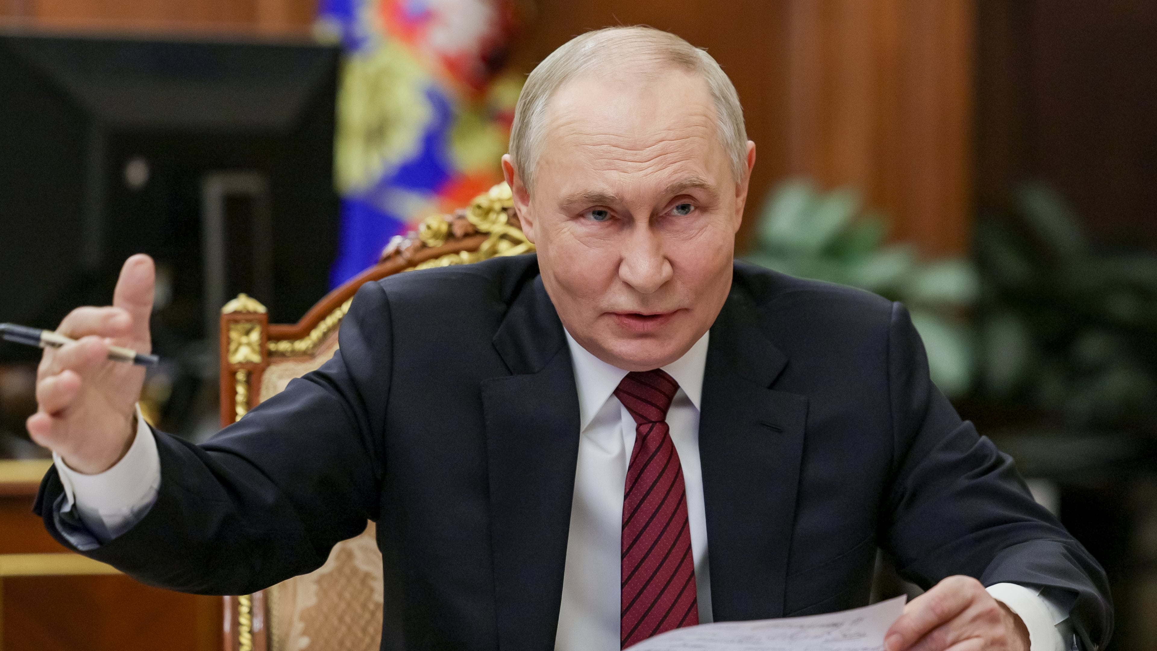 Russian President Vladimir Putin gestures during a call with military leaders on the Ukraine battlefield situation at the Kremlin in Moscow, on Thursday, Dec. 11, 2025. (Gavriil Grigorov, Sputnik, Kremlin Pool Photo via AP)