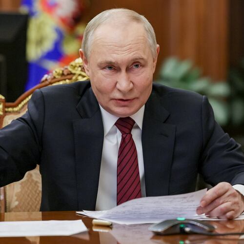 Russian President Vladimir Putin gestures during a call with military leaders on the Ukraine battlefield situation at the Kremlin in Moscow, on Thursday, Dec. 11, 2025. (Gavriil Grigorov, Sputnik, Kremlin Pool Photo via AP)