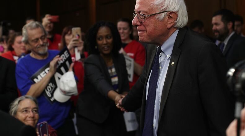 U.S. Sen. Bernie Sanders, I- Vt., greets supporters as he arrives at an event on health care last week on Capitol Hill in Washington, DC. Alex Wong/Getty Images