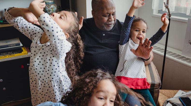 Barry Sage-El, 69, who describes himself as the master of the sleepover, with his three granddaughters at his home in Montclair, N.J. Men have been creating new norms for grandparenting with help from a growing body of resources, including the Atlanta-based podcast, the Cool Grandpa, launched five years ago by Cumming resident Greg Payne.  (Sara Naomi Lewkowicz/The New York Times)