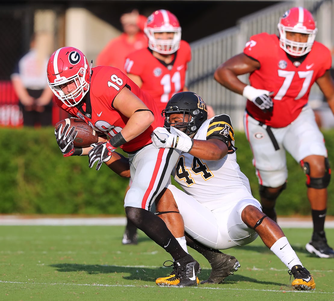 Photos: Bulldogs win but QB Jacob Eason is injured