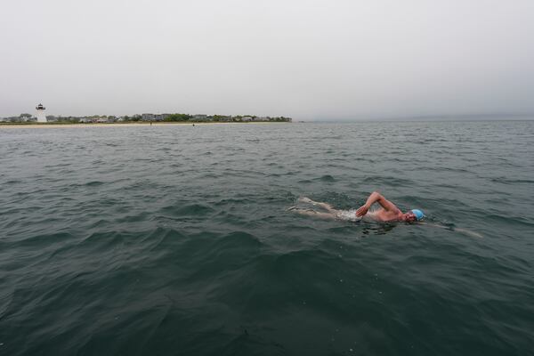 Endurance swimmer Louis Pugh swims off the coast pf Edgartown, Mass., Thursday, May 15, 2025. (AP Photo/Robert F. Bukaty)