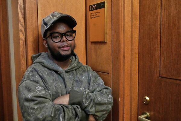 Case Western Reserve University student. Justen Pippens poses for a photo outside the recently closed Office of Inclusion, Diversity and Equal Opportunity at the school In Cleveland Thursday, April 17, 2025. (AP Photo/Sue Ogrocki)