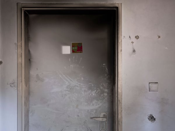 Bullet holes and smoke damage are seen in the bedroom of Ziv Berman, 26, in Kibbutz Kfar Aza, Israel, on Monday, June 24, 2024. Berman and his twin brother, Gali, were abducted on Oct. 7, 2023. (AP Photo/Oded Balilty, File)