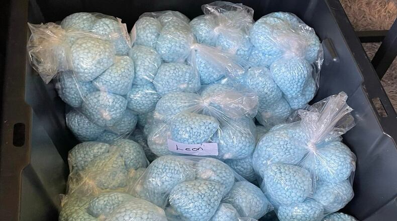 This photo provided by the U.S. Drug Enforcement Administration shows pills containing fentanyl which were seized by the DEA in New Mexico, on April 28, 2025. (DEA via AP)