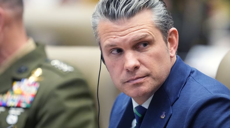 Defense Secretary Pete Hegseth listens during the inaugural Americas Counter Cartel Conference at U.S. Southern Command in Doral, Fla., Thursday, March 5, 2026. (AP Photo/Rebecca Blackwell)