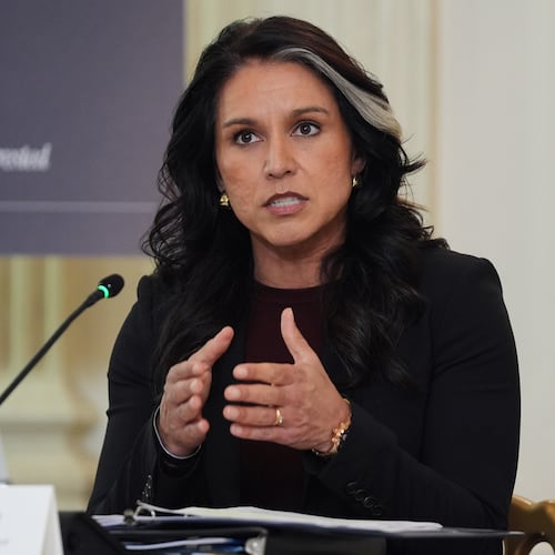 Director of National Intelligence Tulsi Gabbard speaks during a roundtable on criminal cartels with President Donald Trump in the State Dining Room of the White House, Thursday, Oct. 23, 2025, in Washington. (AP Photo/Evan Vucci)