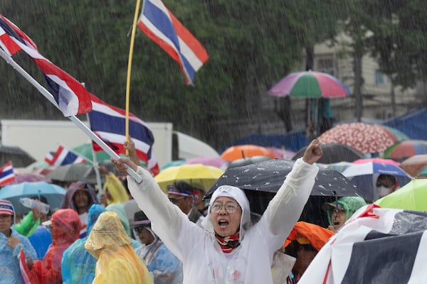 Protesters gather at Victory Monument demanding Thailand's Prime Minister Paetongtarn Shinawatra resign in Bangkok, Thailand, Saturday, June 28, 2025. (AP Photo/Wason Wanichakorn)