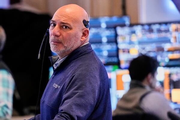 Trader Vincent Napolitano works on the floor of the New York Stock Exchange, Wednesday, April 16, 2025. (AP Photo/Richard Drew)