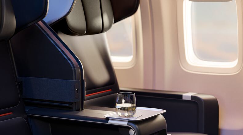 Delta Air Lines' Basic plan gives you all the perks you'd normally get in first class, just not the benefits you'd see at the airport. (Courtesy of Delta)