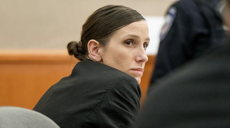 FILE -Kouri Richins looks on during her murder trial at the Summit County Courthouse in Park City, Utah, Monday, Feb. 23, 2026. (AP Photo/Spenser Heaps, Pool, File)