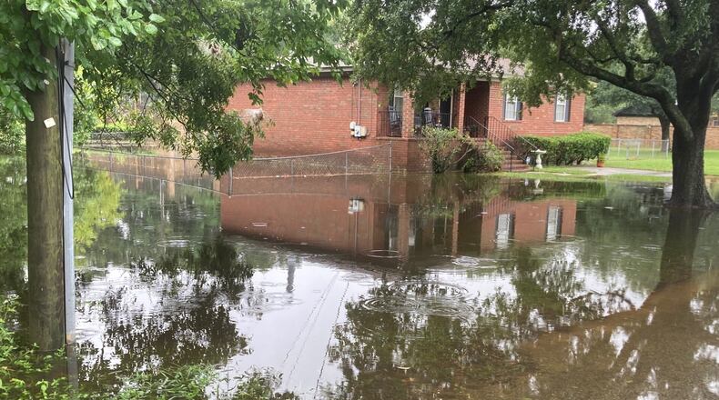 Tropical Storm Debby left behind a flooded yard in Savannah.