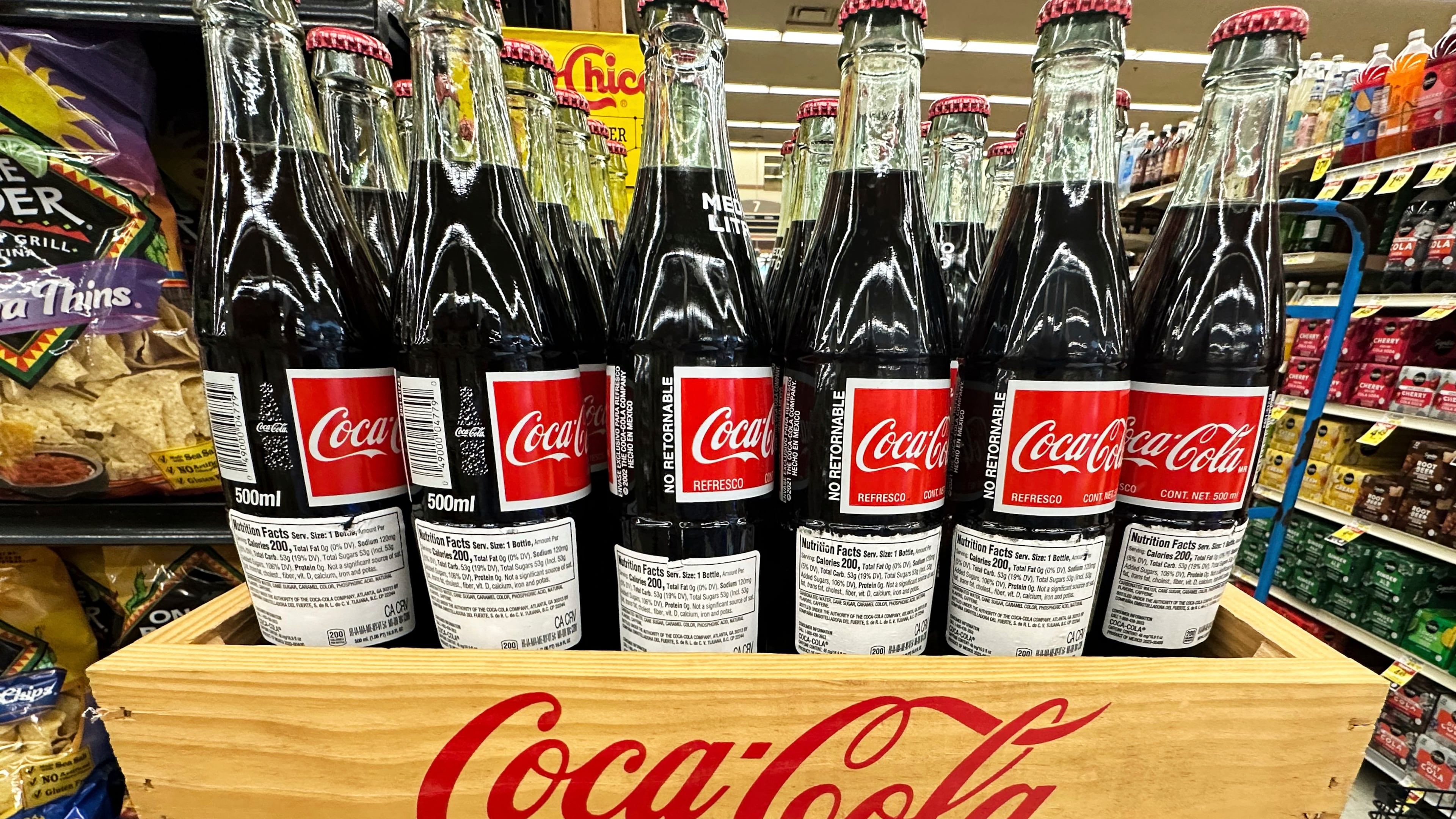 FILE - Bottles of Mexican Coca-Cola are displayed at a grocery store in Mount Prospect, Ill., Thursday, July 17, 2025. (AP Photo/Nam Y. Huh, File)