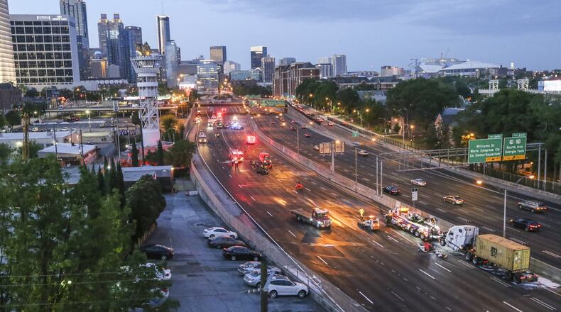Barely two weeks after the I-85 fire and bridge collapse, metro Atlanta woke up Monday, April 17, 2017 to another traffic nightmare: a chemical spill on the Downtown Connector that blocked both sides of the interstate for hours. JOHN SPINK /JSPINK@AJC.COM