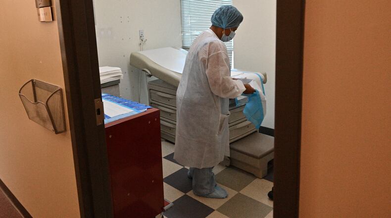 June 29, 2022 Atlanta - A clinic staffer prepares for a patient at an examining room at Feminist Women's Health Center on Wednesday, June 29, 2022.(Hyosub Shin / Hyosub.Shin@ajc.com)
