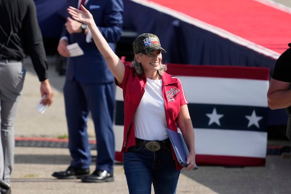 Sen. Joni Ernst, R-Iowa, arrives before President Donald Trump speaks at a rally, Thursday, July 3, 2025, in Des Moines, Iowa. (AP Photo/Charlie Neibergall)