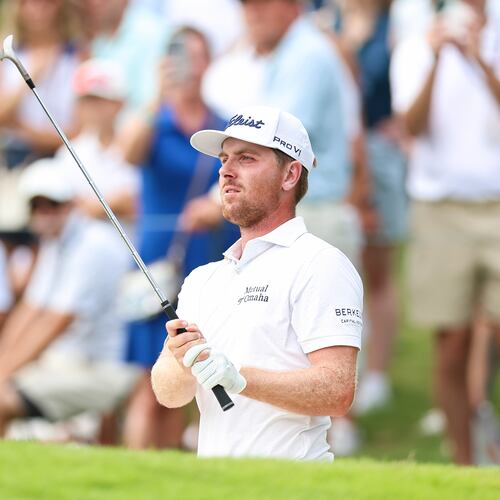 Ryan Gerard plays a shot from a bunker on the 18th hole during the second round of the Tour Championship golf tournament, Friday, Aug. 28, 2026, in Atlanta. (AP Photo/Colin Hubbard)