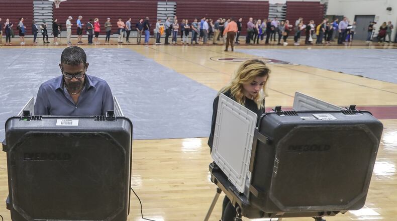Voters waited over an hour to vote at Henry W. Grady High School in Atlanta on Tuesday Nov. 6, 2018. JOHN SPINK/JSPINK@AJC.COM