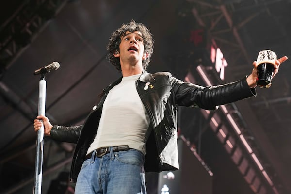 Matty Healy of The 1975 performs during the Glastonbury Festival in Worthy Farm, Somerset, England, Friday, June 27, 2025. (Scott A Garfitt/Invision/AP)