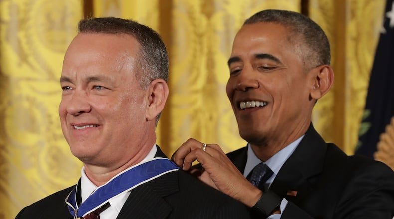 WASHINGTON, DC - NOVEMBER 22: U.S. President Barack Obama awards the Presidential Medal of Freedom to Academy Award winner, filmmaker and social justice advocate Tom Hanks during a ceremony in the East Room of the White House November 22, 2016 in Washington, DC. Obama presented the medal to 19 living and two posthumous pioneers in science, sports, public service, human rights, politics and the arts. (Photo by Chip Somodevilla/Getty Images)