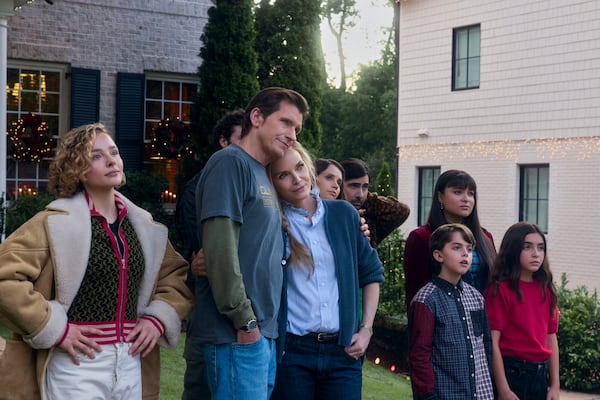 (From left) Chloë Grace Moretz, Denis Leary, Michelle Pfeiffer, Felicity Jones, Jason Schwartzman and Devery Jacobs in the 2025 Amazon Christmas film "Oh. What. Fun." (Alisha Wetherill/Courtesy of Amazon Studios)