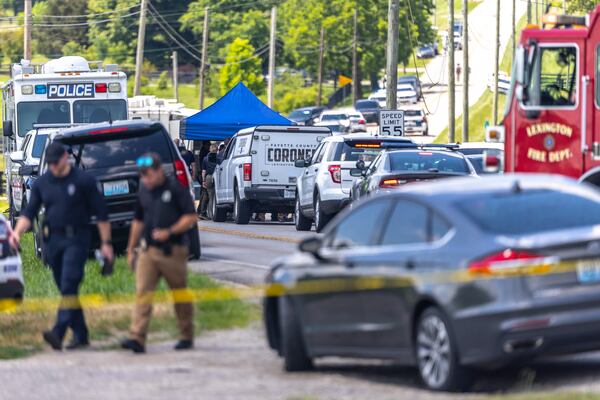 Law enforcement members respond to a shooting near Richmond Road Baptist Church in Lexington, Ky., Sunday, July 13, 2025. (Ryan C. Hermens/Lexington Herald-Leader via AP)
