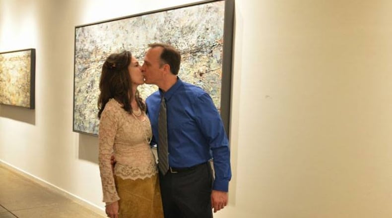 Ellen and Brad DeLoach in front of one of her first paintings at the Bill Lowe Gallery in Atlanta. (Credit: Bill Lowe Gallery)