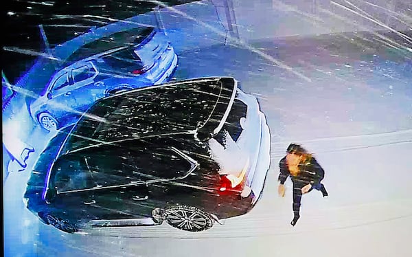 A video from a "Ring" camera at John O'Keefe's home, Karen Read is seen arriving in her SUV to look for O'Keefe with Kerry Roberts and Jennifer McCabe is shown during Read's trial in Norfolk Superior Court at Dedham, Mass., on Wednesday, April 23, 2025 (Greg Derr/The Patriot Ledger via AP, Pool)