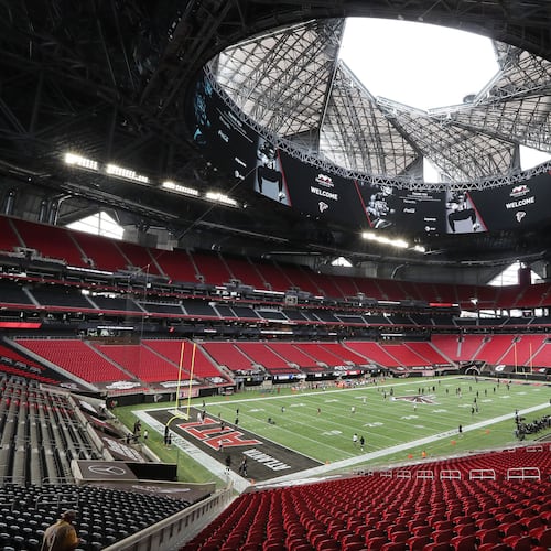 Mercedes-Benz Stadium is empty of fans but the Atlanta Falcons opened the roof as they prepared to play the Seattle Seahawks on Sunday, Sept. 13, 2020, in Atlanta. (Curtis Compton/AJC)