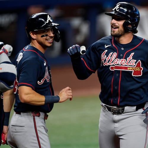 Atlanta Braves' Austin Riley, right, celebrates hitting a home run during the second inning of a baseball game, Wednesday, May 20, 2026, in Miami. (Michael Laughlin/AP)