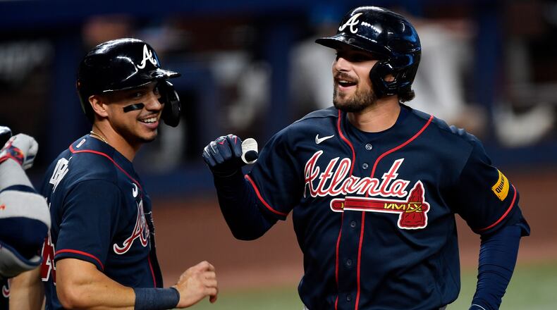 Atlanta Braves' Austin Riley, right, celebrates hitting a home run during the second inning of a baseball game, Wednesday, May 20, 2026, in Miami. (Michael Laughlin/AP)
