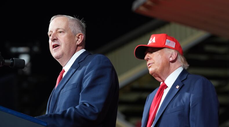 President Donald Trump listens as North Carolina Republican U.S. Senate candidate Michael Whatley speaks during a rally at Gastonia Municipal Airport, Wednesday, Sept. 16, 2026, in Gastonia, N.C. (AP Photo/Alex Brandon)