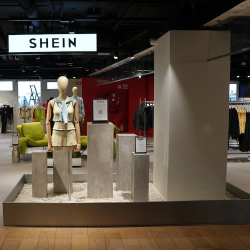 Clothes by Chinese company Shein are seen in the BHV (Bazar de l'Hotel de Ville) general store, ahead of the Shein stand opening, Tuesday, Nov. 4, 2025 in Paris. (AP Photo/Aurelien Morissard)