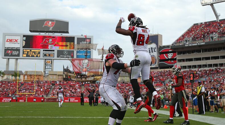 TAMPA, FL - NOVEMBER 09: Roddy White #84 of the Atlanta Falcons reacts after scoring a touchdown during the second half of the game against the Tampa Bay Buccaneers at Raymond James Stadium on November 9, 2014 in Tampa, Florida. (Photo by Mike Ehrmann/Getty Images) Roddy White's fourth-quarter touchdown catch gave the Falcons a lead. (Mike Ehrmann/Getty Images)