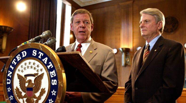 Photo by Rick McKay/Washington Bureau
slug: COX-BASEBALL-0718
WASHINGTON... Rep. Johnny Isakson, R-Ga., left, and Sen. Zell Miller, D-Ga., right, talk about their bipartisan legislation to avert a baseball strike at a news conference on Capitol Hill Wednesday. Their resolutions in the House and Senate urge the Federal Mediation and Conciliation Service to intervene to help the Major League Baseball Players Association and the owners of Major League Baseball to reach an agreement that will avert a baseball strike or lockout. (Photo by Rick McKay/Cox Washington Bureau)