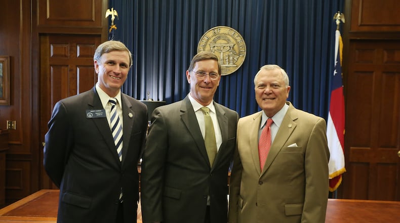 Last July, state Sen. Marty Harbin, R-Tyrone, (left) joined Gov. Nathan Deal (right) for the swearing in of Jim Pace to the Georgia Film, Music and Digital Entertainment Advisory Commission. The above photograph is now evidence of how the film-making industry has muddle the “religious liberty” debate in Georgia. On Tuesday, Harbin called for a special session to override Deal’s veto of HB 757. Pace, an associate of Dan Cathy, who helped bring a major studio to south metro Atlanta, wants to shift the argument to Congress.
