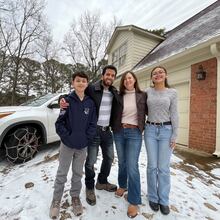 The Laboy family (pictured) welcomed a stranger, Evline Simmons, into their Snellville home Tuesday night after she became stranded by the icy roads.