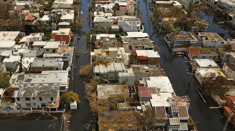 Southern Company was awarded for aiding in power restoration efforts in Puerto Rico. 99 percent of power has been now been restoredoon the island ravaged by hurricane Maria. (Carolyn Cole/Los Angeles Times/TNS)