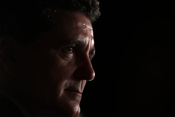 Presidential candidate Nicusor Dan speaks to media after polls closed in the first round of the country's presidential election redo in Bucharest, Romania, Sunday, May 4, 2025. (AP Photo/Eduard Vinatoru)