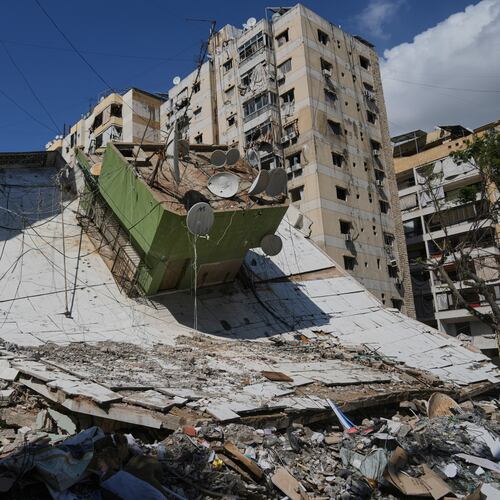 A building destroyed in a previous Israeli airstrike is seen in Dahiyeh, Beirut's southern suburbs, Lebanon, Wednesday, May 6, 2026. (AP Photo/Bilal Hussein)